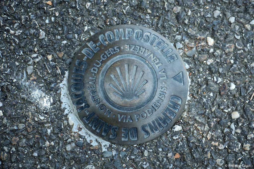 Badge of the Route of Santiago de Compostela on the ground in Montreal